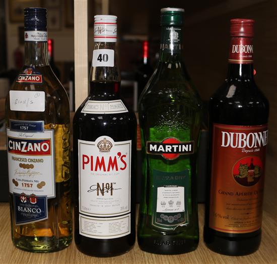 Four various bottles (Pimms, Cinzano, Dubonet and Martini)